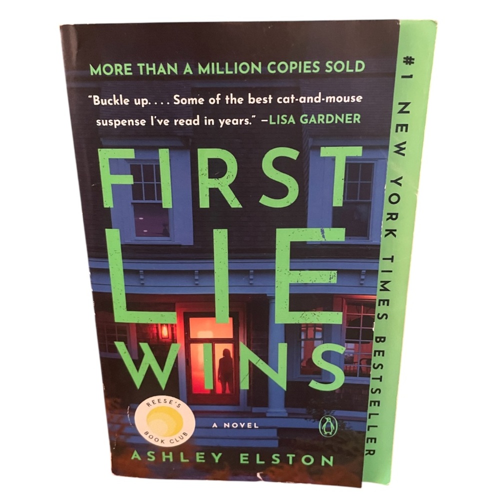 First Lie Wins Hardcover Book by Ashley Elston